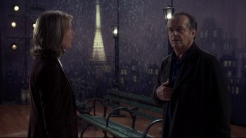 Movie still from “Something's Gotta Give” (2003), directed by Nancy Meyers – A man and a woman standing next to each other in the rain; Medium shot, Over the shoulder angle