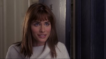Movie still from “Something's Gotta Give” (2003), directed by Nancy Meyers – A person wearing a white sweater; Close Up shot, Over the shoulder angle