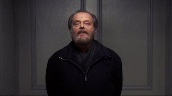 Movie still from “Something's Gotta Give” (2003), directed by Nancy Meyers – An older man with a beard and a black jacket; Medium shot, Low angle