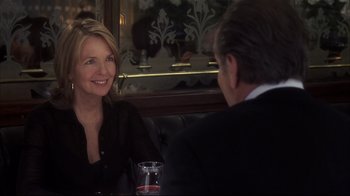 Movie still from “Something's Gotta Give” (2003), directed by Nancy Meyers – A man and a woman are sitting at a table; Close Up shot, Over the shoulder angle