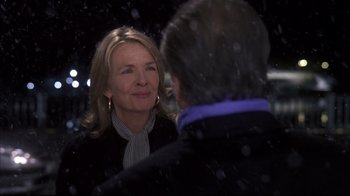 Movie still from “Something's Gotta Give” (2003), directed by Nancy Meyers – A woman and a man are talking in the snow; Close Up shot, Over the shoulder angle