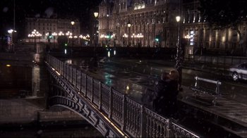Movie still from “Something's Gotta Give” (2003), directed by Nancy Meyers – Two people are walking on a bridge at night; Extreme Wide shot, High angle