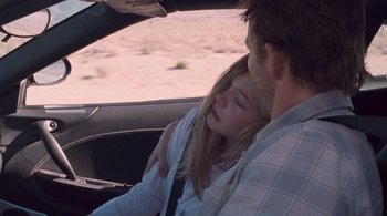 Movie still from “Somewhere” (2010), directed by Sofia Coppola – A man and a girl in a car; Close Up shot, Over the shoulder angle