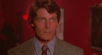 Movie still from “Somewhere in Time” (1980), directed by Jeannot Szwarc – A person wearing a suit and tie; Close Up shot, Over the shoulder angle