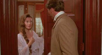 Movie still from “Somewhere in Time” (1980), directed by Jeannot Szwarc – A man and a woman are looking at each other; Medium shot, Over the shoulder angle