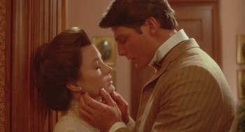 Movie still from “Somewhere in Time” (1980), directed by Jeannot Szwarc – A man and a woman are looking at each other; Close Up shot, Over the shoulder angle