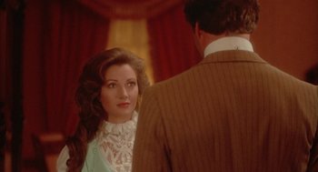 Movie still from “Somewhere in Time” (1980), directed by Jeannot Szwarc – A man and a woman are looking at one another; Close Up shot, Over the shoulder angle