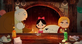 Movie still from “Song of the Sea” (2014), directed by Tomm Moore – A group of people sitting around a table with food on top of it; Wide shot, Low angle