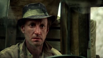 Movie still from “Sorcerer” (1977), directed by William Friedkin – A person wearing a hat; Close Up shot, Low angle