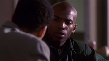 Movie still from “Soul Food” (1997), directed by George Tillman Jr. – A man is looking into the reflection of himself in the mirror; Close Up shot, Over the shoulder angle
