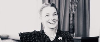Movie still from “Sound of Noise” (2010), directed by Ola Simonsson – An old photo of a woman smiling for the camera; Close Up shot, Low angle