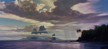 Movie still from “South Pacific” (1958), directed by Joshua Logan – A view of a body of water and a cloudy sky; Extreme Wide shot, Low angle