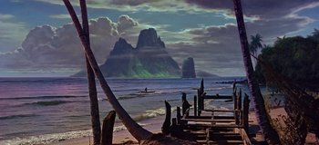 Movie still from “South Pacific” (1958), directed by Joshua Logan – A person in a canoe in the ocean; Extreme Wide shot, Low angle