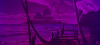 Movie still from “South Pacific” (1958), directed by Joshua Logan – A painting of a purple sky and a body of water; Extreme Wide shot, Low angle