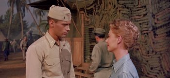 Movie still from “South Pacific” (1958), directed by Joshua Logan – A man and a woman talking to each other; Medium shot, Over the shoulder angle
