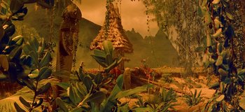 Movie still from “South Pacific” (1958), directed by Joshua Logan – An image of an outdoor scene with plants and trees; Extreme Wide shot, High angle
