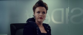 Movie still from “Southland Tales” (2006), directed by Richard Kelly – A person sitting in a chair; Close Up shot, Low angle