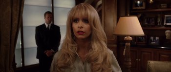 Movie still from “Southland Tales” (2006), directed by Richard Kelly – A woman with long blonde hair wearing a white shirt; Close Up shot, Over the shoulder angle