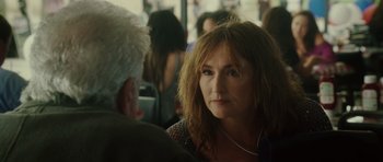 Movie still from “Southland Tales” (2006), directed by Richard Kelly – A person sitting on a bus; Close Up shot, Over the shoulder angle