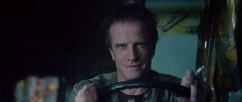 Movie still from “Southland Tales” (2006), directed by Richard Kelly – A person holding a steering wheel; Close Up shot, Low angle