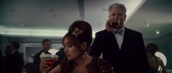 Movie still from “Southland Tales” (2006), directed by Richard Kelly – A man and a woman are drinking from a glass; Close Up shot, Over the shoulder angle