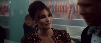 Movie still from “Southland Tales” (2006), directed by Richard Kelly – A person wearing a dress; Close Up shot, Over the shoulder angle