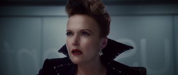 Movie still from “Southland Tales” (2006), directed by Richard Kelly – A person wearing a black jacket; Close Up shot, Low angle