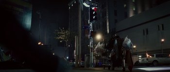Movie still from “Southland Tales” (2006), directed by Richard Kelly – A street corner at night with traffic lights and street signs; Extreme Wide shot, Low angle