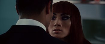 Movie still from “Southland Tales” (2006), directed by Richard Kelly – A man and a woman looking into each others eyes; Close Up shot, Over the shoulder angle