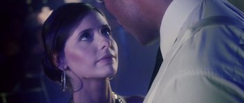 Movie still from “Southland Tales” (2006), directed by Richard Kelly – A man and a woman looking into each others eyes; Close Up shot, Over the shoulder angle
