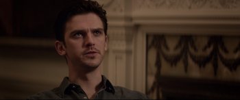 Movie still from “A Walk Among the Tombstones” (2014), directed by Scott Frank – A person looking at the camera; Close Up shot, Over the shoulder angle