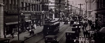 Movie still from “Soylent Green” (1973), directed by Richard Fleischer – A black and white photo of a city street; Extreme Wide shot, High angle