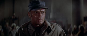 Movie still from “Soylent Green” (1973), directed by Richard Fleischer – A person wearing a hat; Close Up shot, Low angle