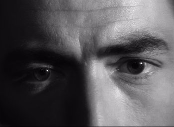 Movie still from “Spellbound” (1945), directed by Alfred Hitchcock – A man's eyes in black and white; Extreme Close Up shot, Overhead angle