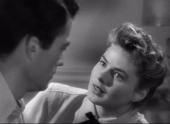 Movie still from “Spellbound” (1945), directed by Alfred Hitchcock – A man and a woman talking to each other; Close Up shot, Over the shoulder angle