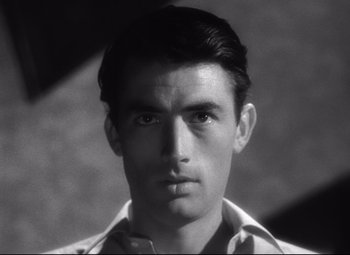 Movie still from “Spellbound” (1945), directed by Alfred Hitchcock – Black and white photograph of a man with a mustache; Close Up shot, High angle