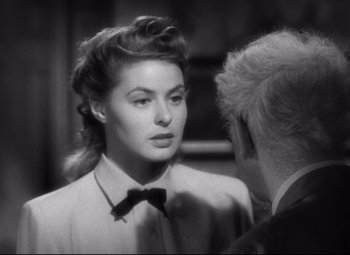 Movie still from “Spellbound” (1945), directed by Alfred Hitchcock – A man and a woman are talking to each other; Close Up shot, Over the shoulder angle