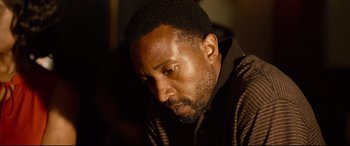 Movie still from “Spiral” (2021), directed by Darren Lynn Bousman – A person looking down; Close Up shot, High angle