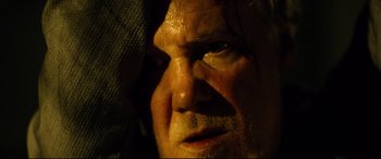 Movie still from “Spiral” (2021), directed by Darren Lynn Bousman – The face of a man; Extreme Close Up shot, Low angle