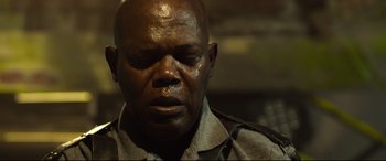 Movie still from “Spiral” (2021), directed by Darren Lynn Bousman – A person with his eyes closed; Close Up shot, Low angle