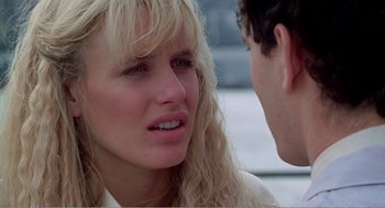 Movie still from “Splash” (1983), directed by Ron Howard – A man and a woman talking to each other; Close Up shot, Over the shoulder angle