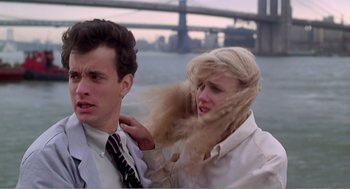 Movie still from “Splash” (1983), directed by Ron Howard – A man and a woman are combing each other's hair; Close Up shot, Low angle
