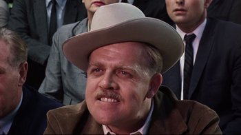 Movie still from “Splendor in the Grass” (1961), directed by Elia Kazan – A person wearing a hat; Close Up shot, Low angle