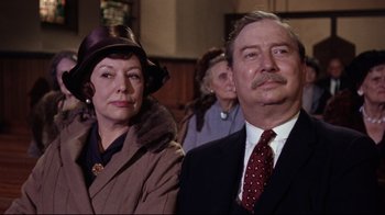 Movie still from “Splendor in the Grass” (1961), directed by Elia Kazan – A man and a woman are standing in a crowd; Close Up shot, Low angle