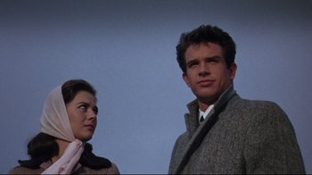Movie still from “Splendor in the Grass” (1961), directed by Elia Kazan – A man and a woman standing next to each other; Close Up shot, Low angle