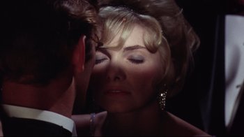Movie still from “Splendor in the Grass” (1961), directed by Elia Kazan – A man and a woman are looking into each others eyes; Close Up shot, Over the shoulder angle