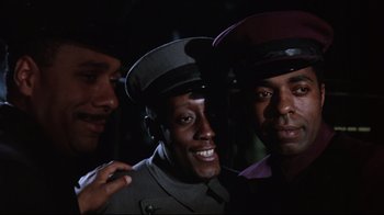 A group of men standing next to each other