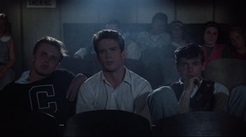Movie still from “Splendor in the Grass” (1961), directed by Elia Kazan – A group of people sitting in a room; Medium shot, Low angle