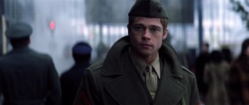 Movie still from “Spy Game” (2001), directed by Tony Scott – A man in a military uniform is looking at the camera; Close Up shot, Low angle