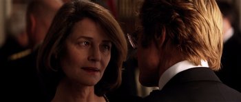 Movie still from “Spy Game” (2001), directed by Tony Scott – A man and a woman are looking at one another; Close Up shot, Over the shoulder angle